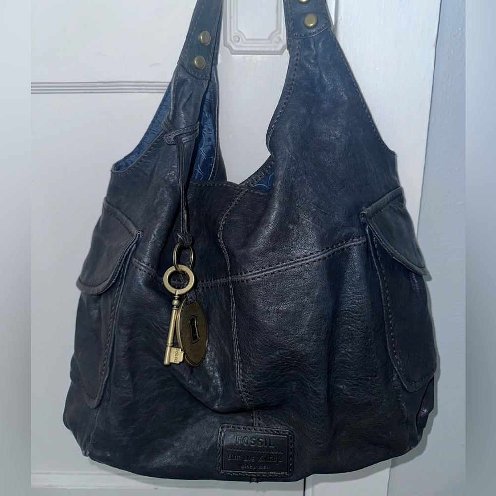black vintage leather fossil bag with gold hardware